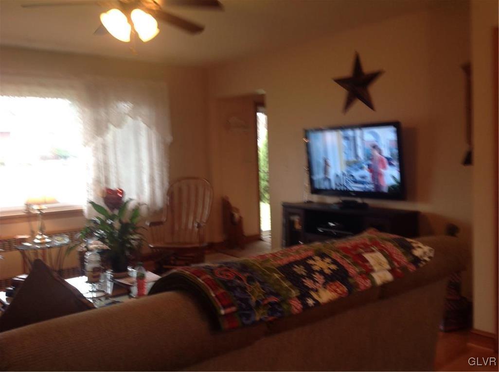 56 Ridgewood Road Easton, PA 18045 - Photo 8 of 19 a living room with furniture and a flat screen tv