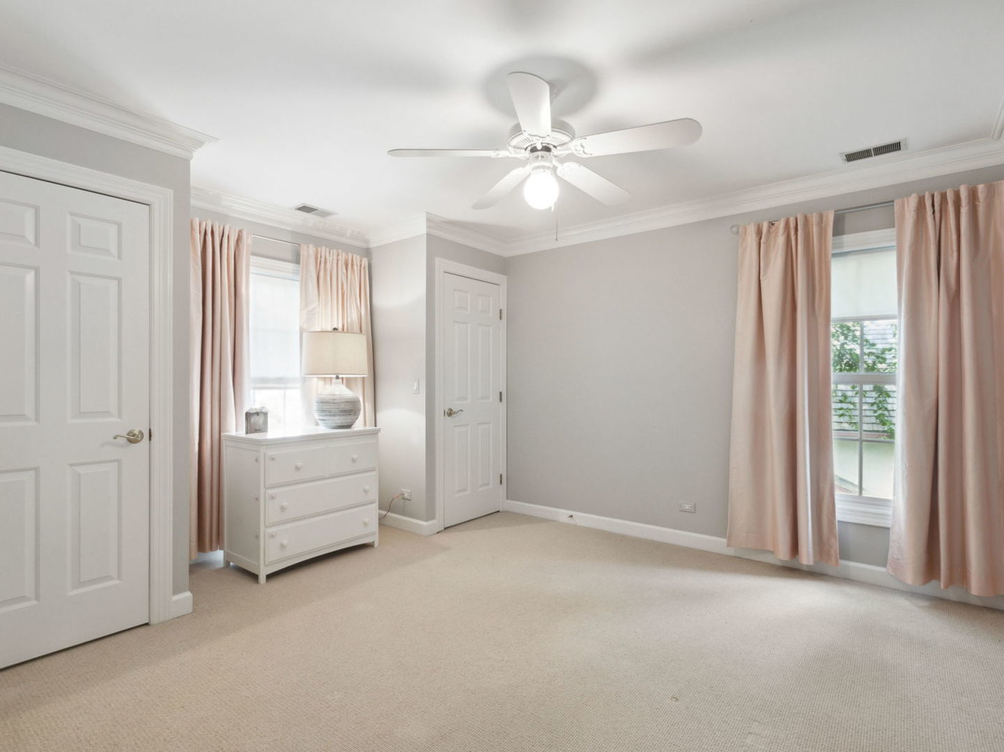 1170 Griffith Road Lake Forest, IL 60045 - Photo 23 of 34 a view of an empty room with chandelier fan and fire place