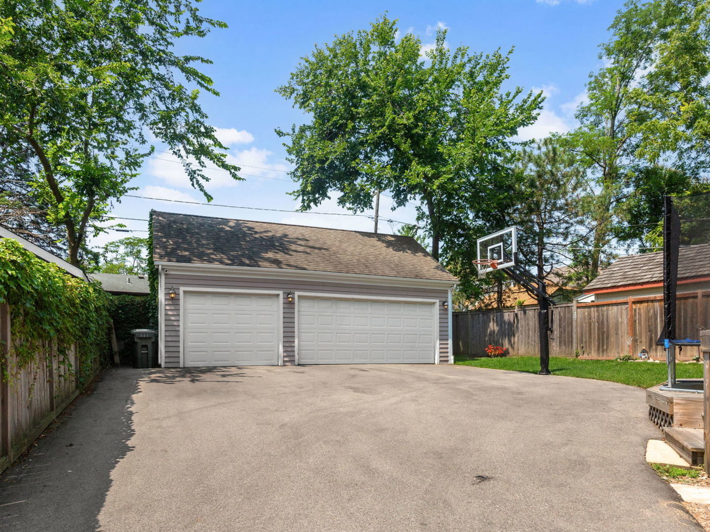 1170 Griffith Road Lake Forest, IL 60045 - Photo 28 of 34 a front view of a house with a yard and garage