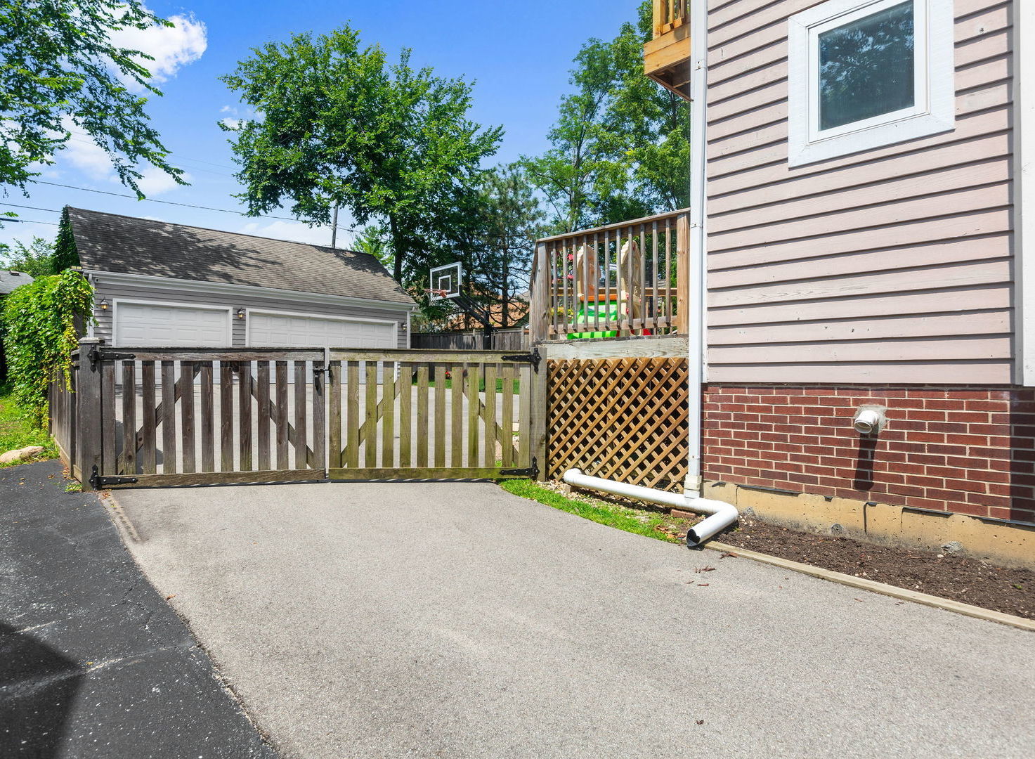 1170 Griffith Road Lake Forest, IL 60045 - Photo 29 of 34 a view of a house with a wooden fence