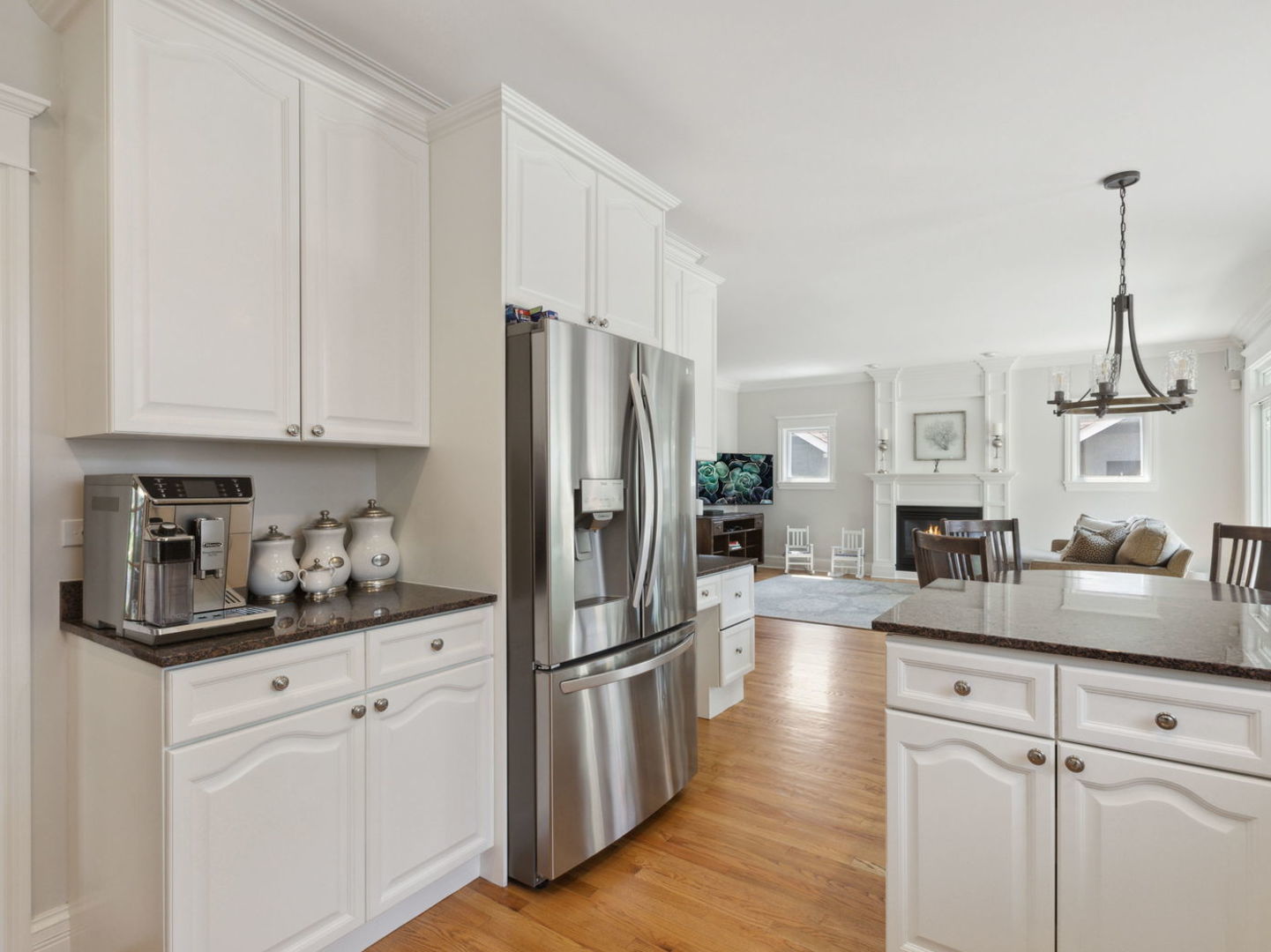 1170 Griffith Road Lake Forest, IL 60045 - Photo 8 of 34 a kitchen with kitchen island white cabinets and stainless steel appliances