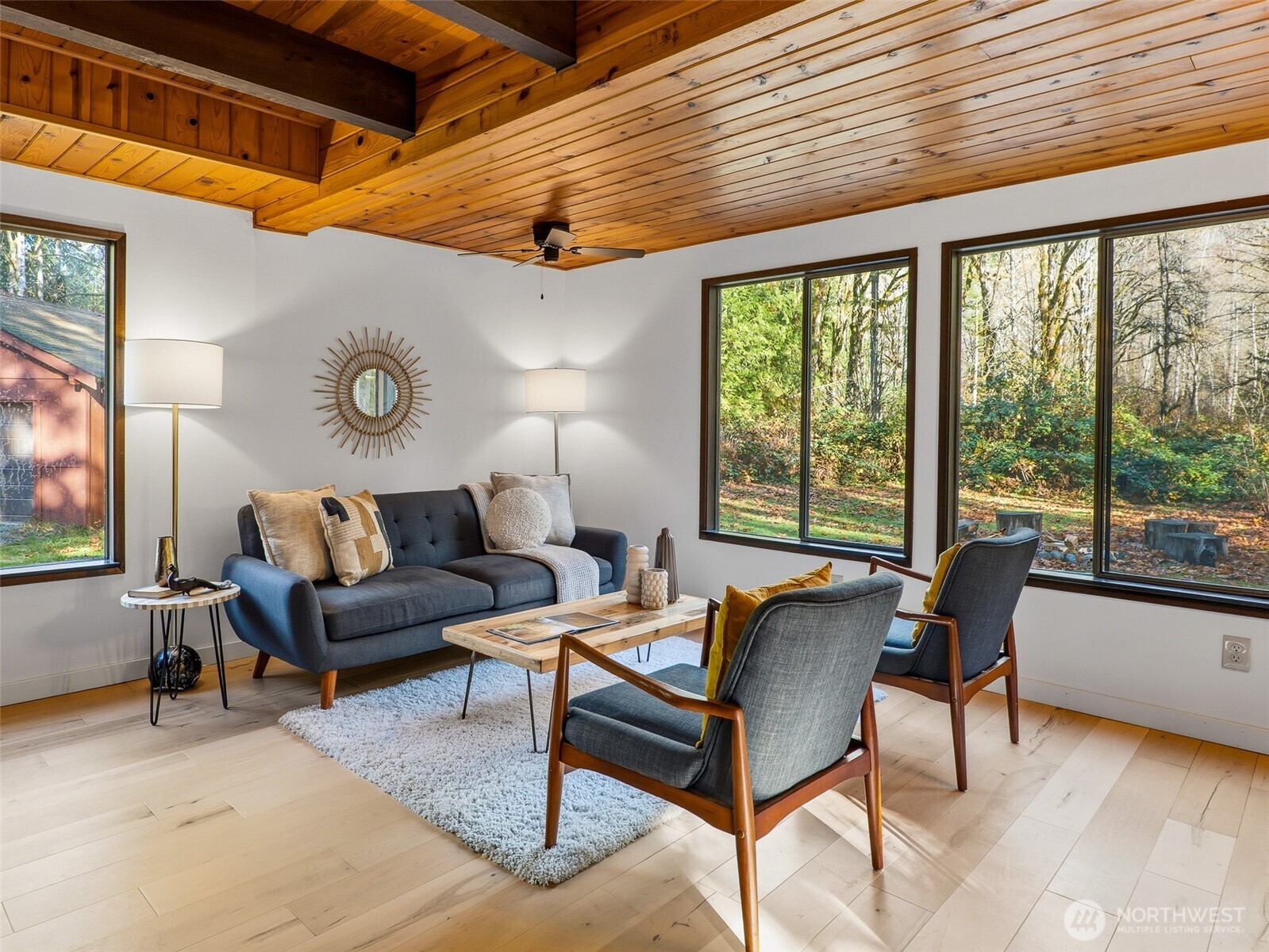 64642 Northeast 178th Street Baring, WA 98251 - Photo 11 of 40 a living room with furniture and a large window
