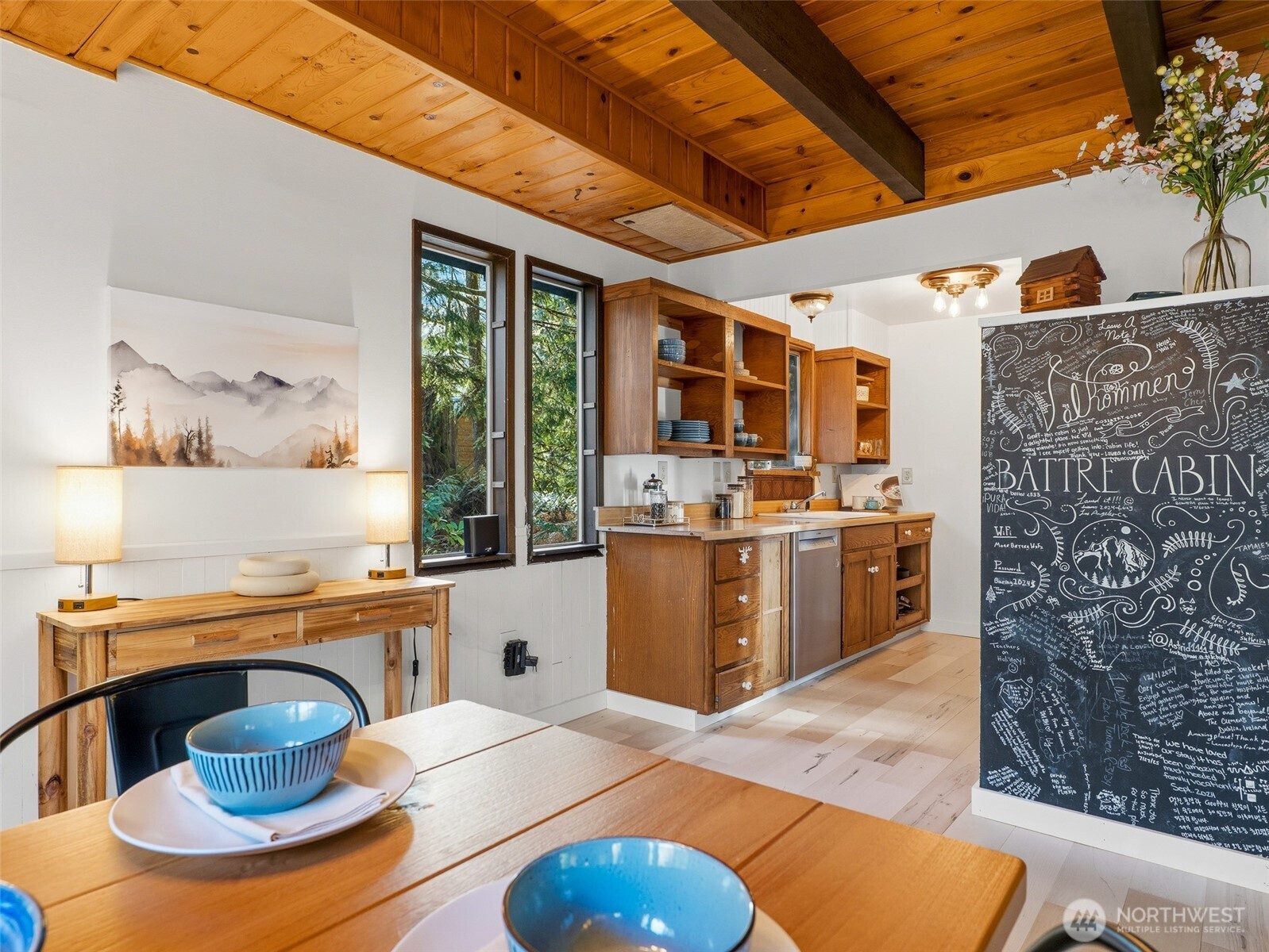 64642 Northeast 178th Street Baring, WA 98251 - Photo 14 of 40 a kitchen with stainless steel appliances kitchen island granite countertop a sink and a counter top space