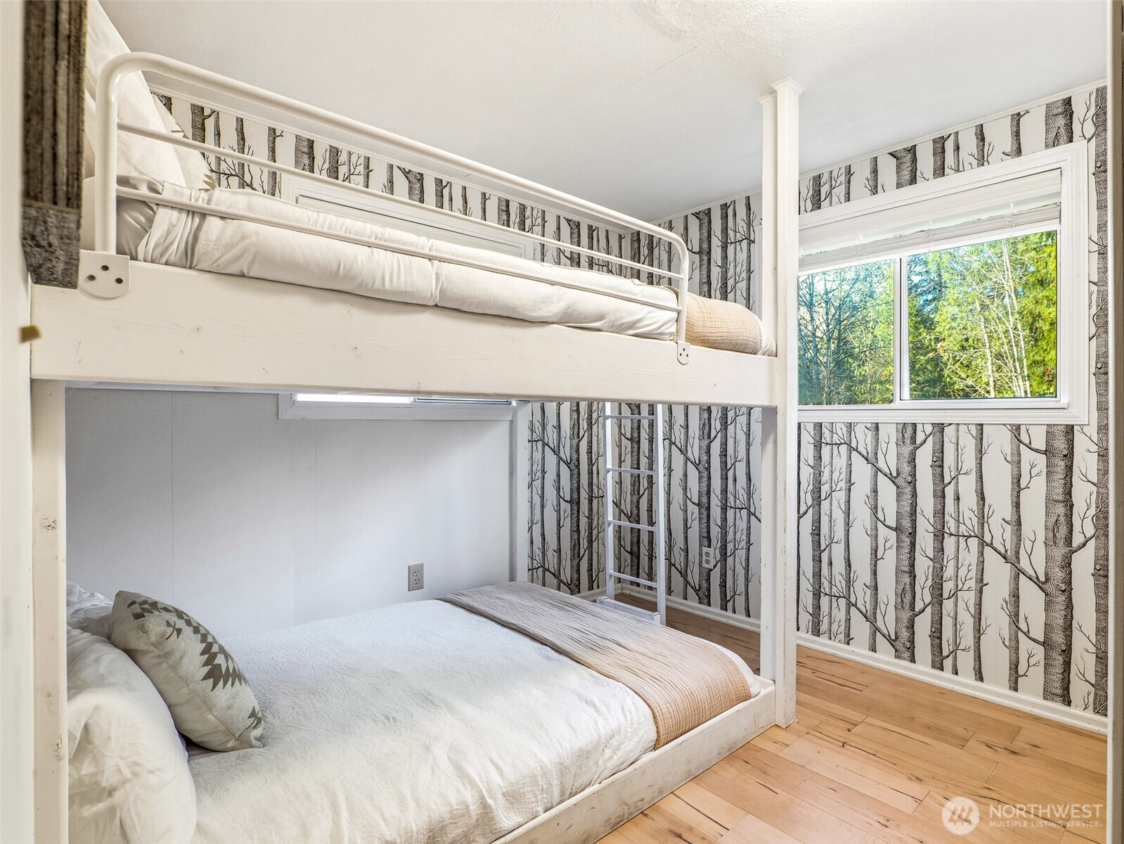 64642 Northeast 178th Street Baring, WA 98251 - Photo 18 of 40 a bedroom with a bed and a window