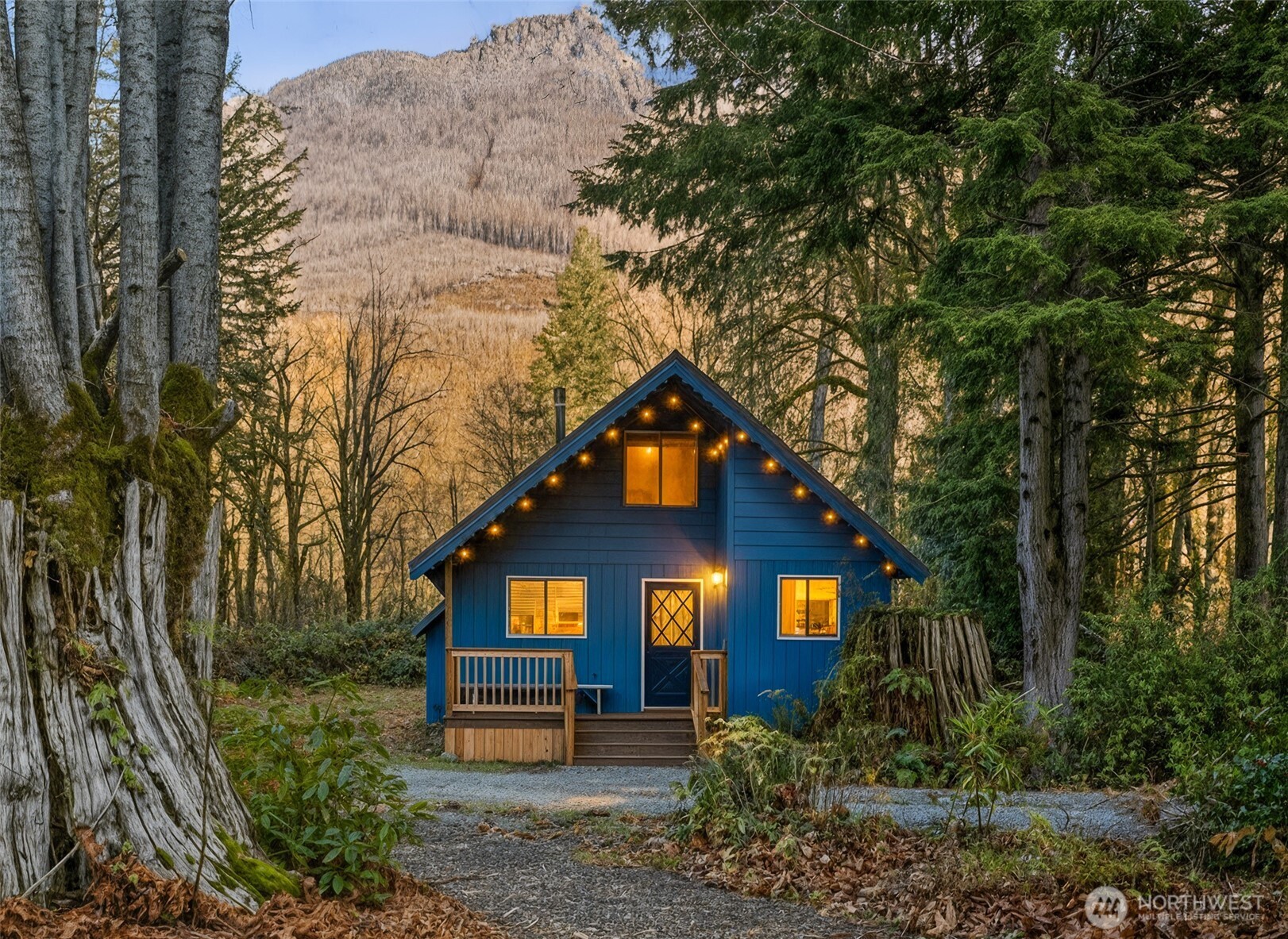 64642 Northeast 178th Street Baring, WA 98251 - Photo 2 of 40 a front view of a house with a yard