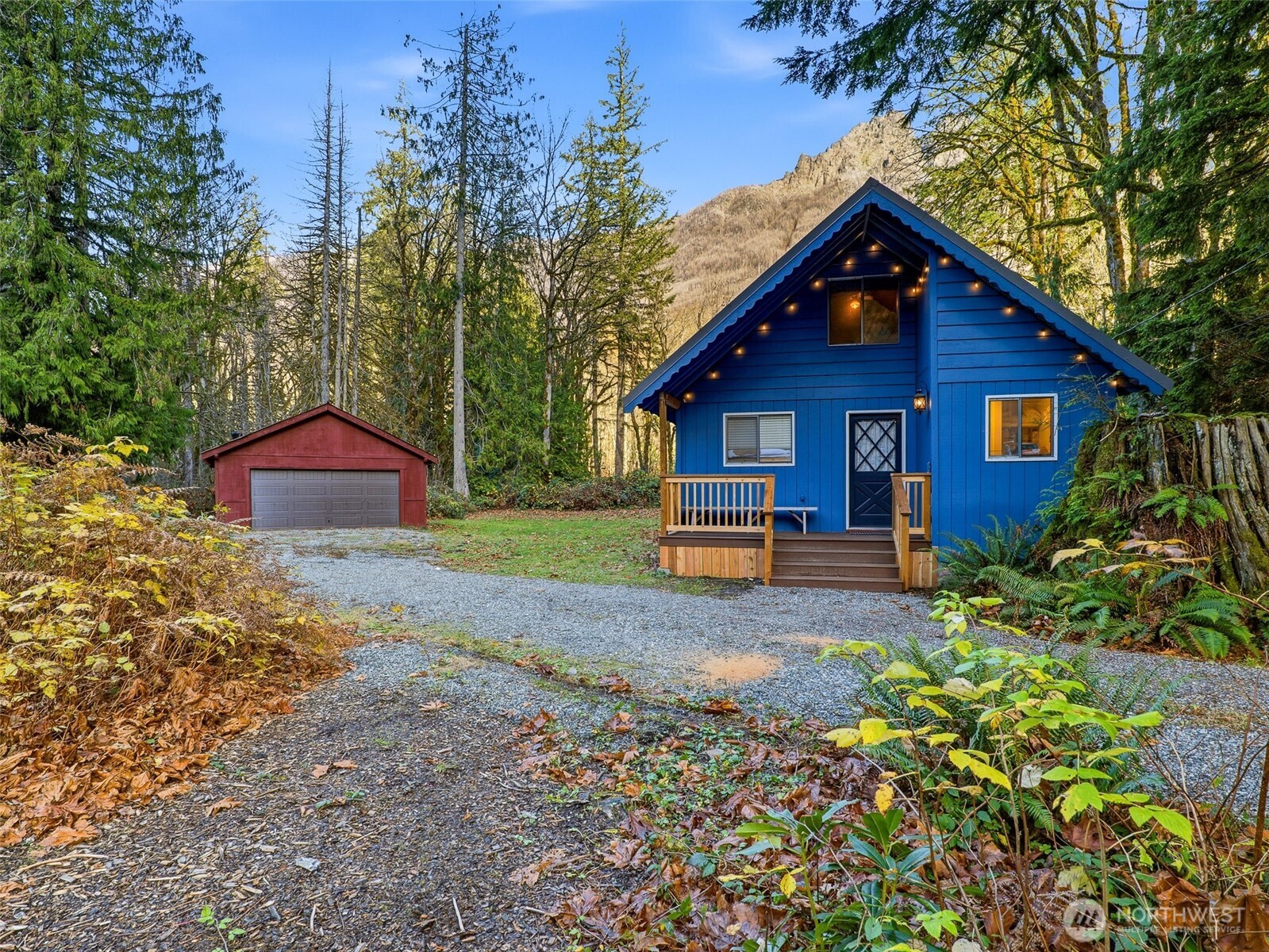 64642 Northeast 178th Street Baring, WA 98251 - Photo 34 of 40 a front view of a house with a yard and garage