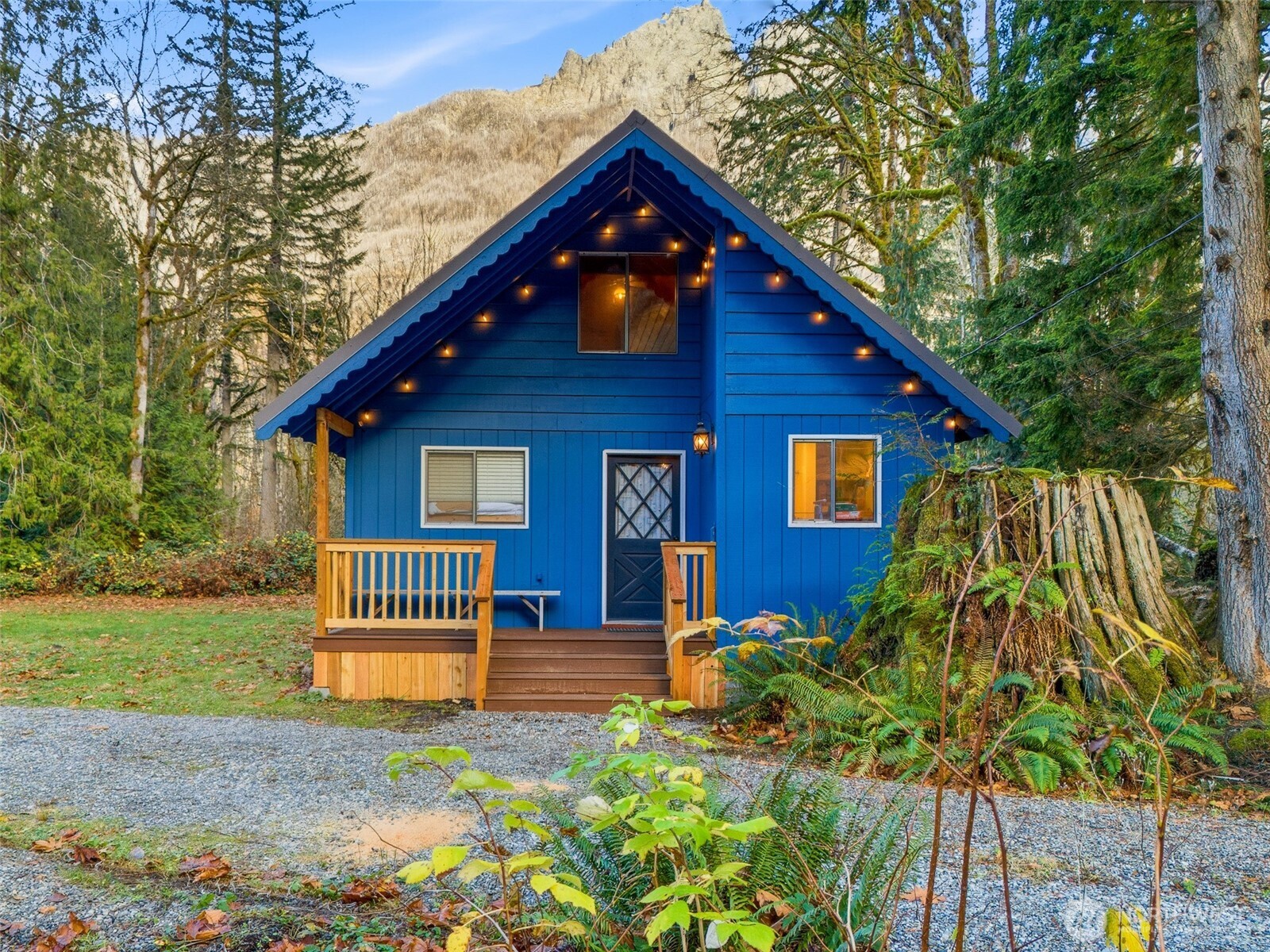 64642 Northeast 178th Street Baring, WA 98251 - Photo 4 of 40 a front view of a house with garden