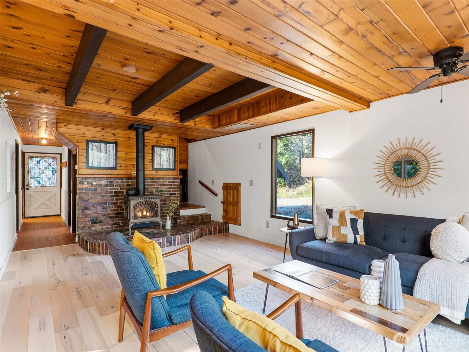 64642 Northeast 178th Street Baring, WA 98251 - Photo 6 of 40 a living room with furniture and a wooden floor