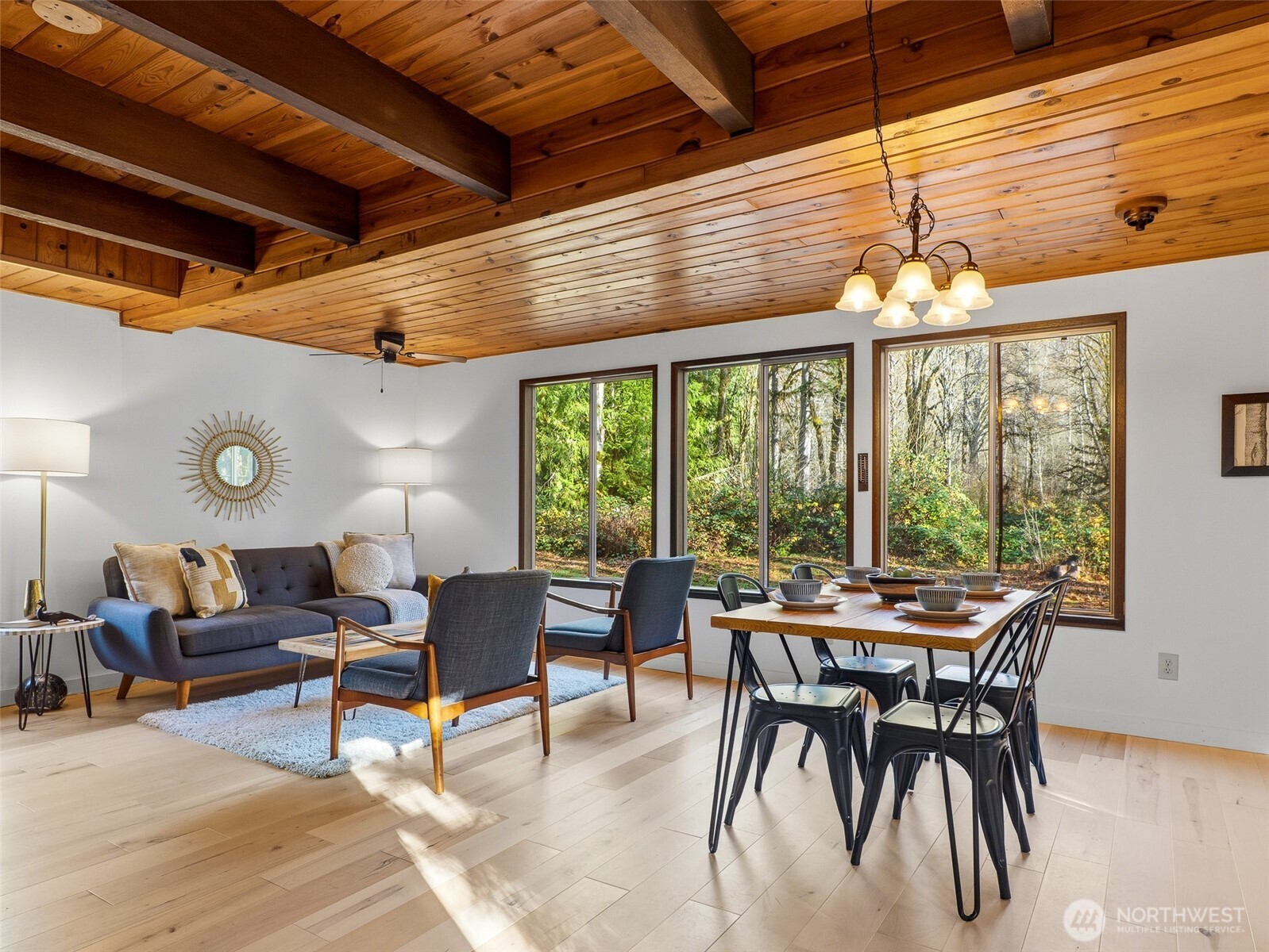 64642 Northeast 178th Street Baring, WA 98251 - Photo 7 of 40 a dining room with furniture a chandelier and a rug