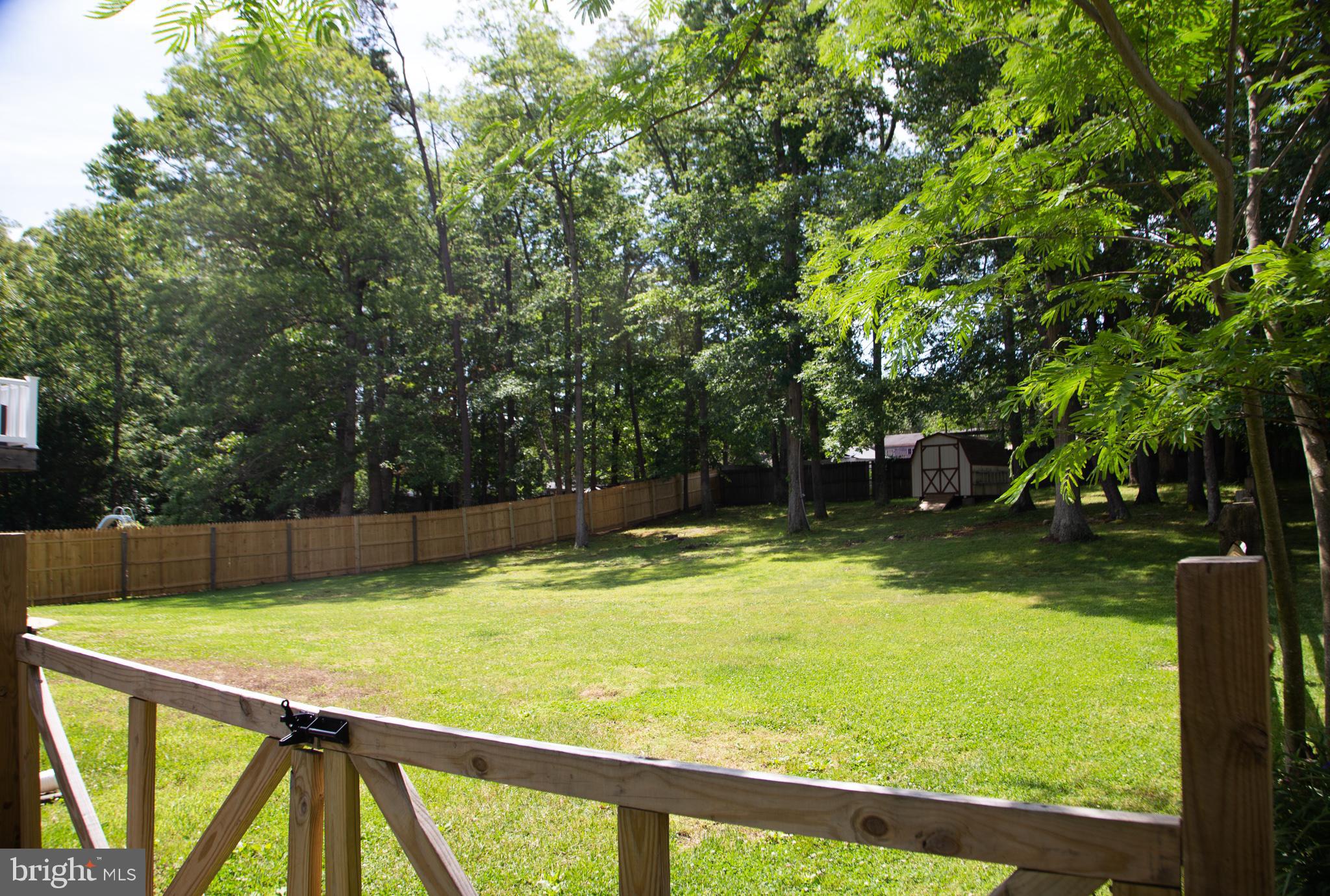 1107 Trunnel Lane Accokeek, MD 20607 - Photo 20 of 27 View of back yard via side of property