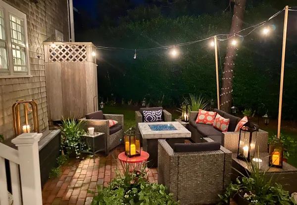 a outdoor space with patio furniture and potted plants