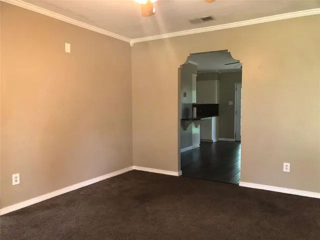an empty room and closet area