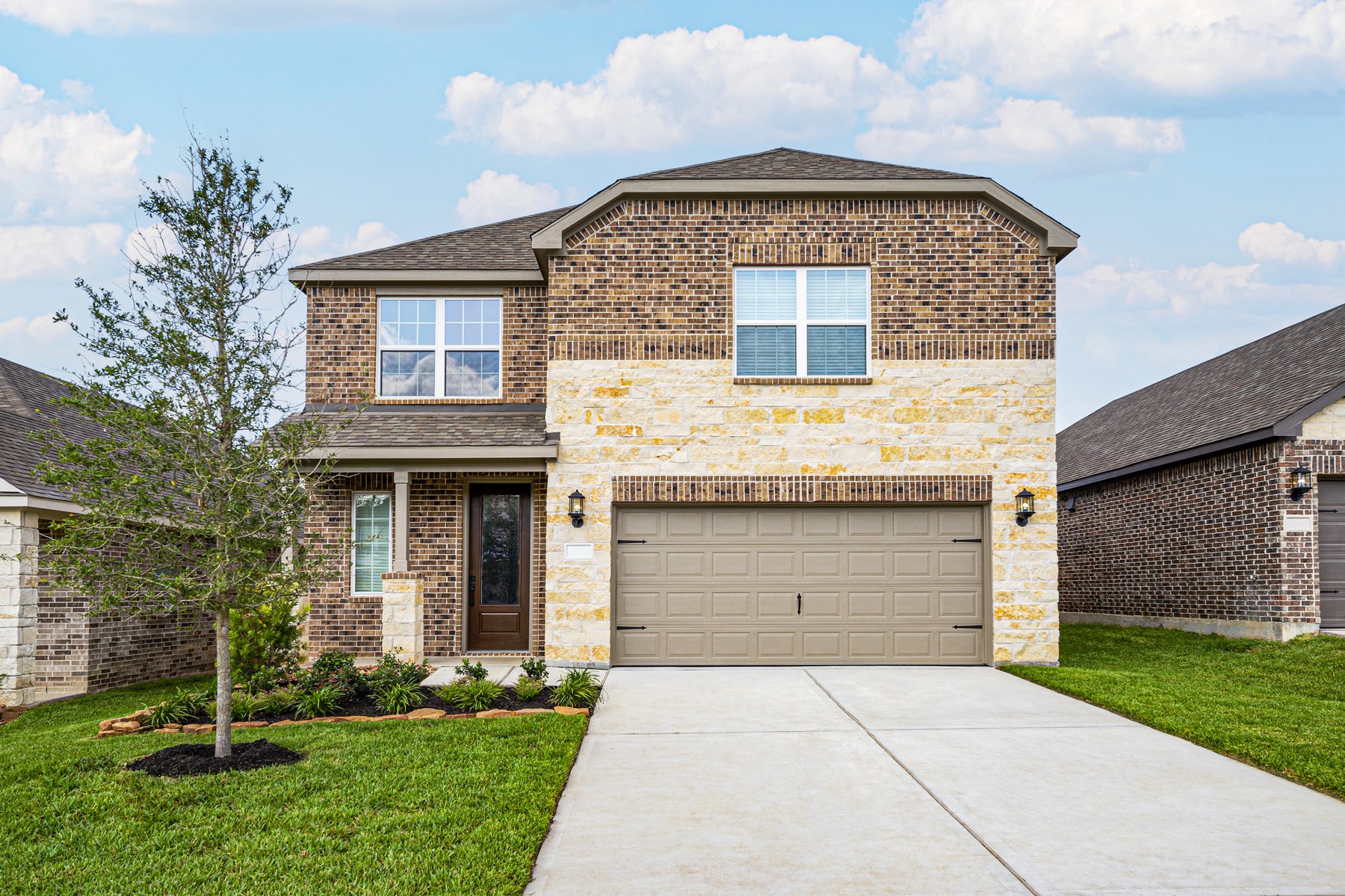 6213 White Spruce Drive Conroe, TX 77304 - Photo 1 of 21 a front view of a house with a yard