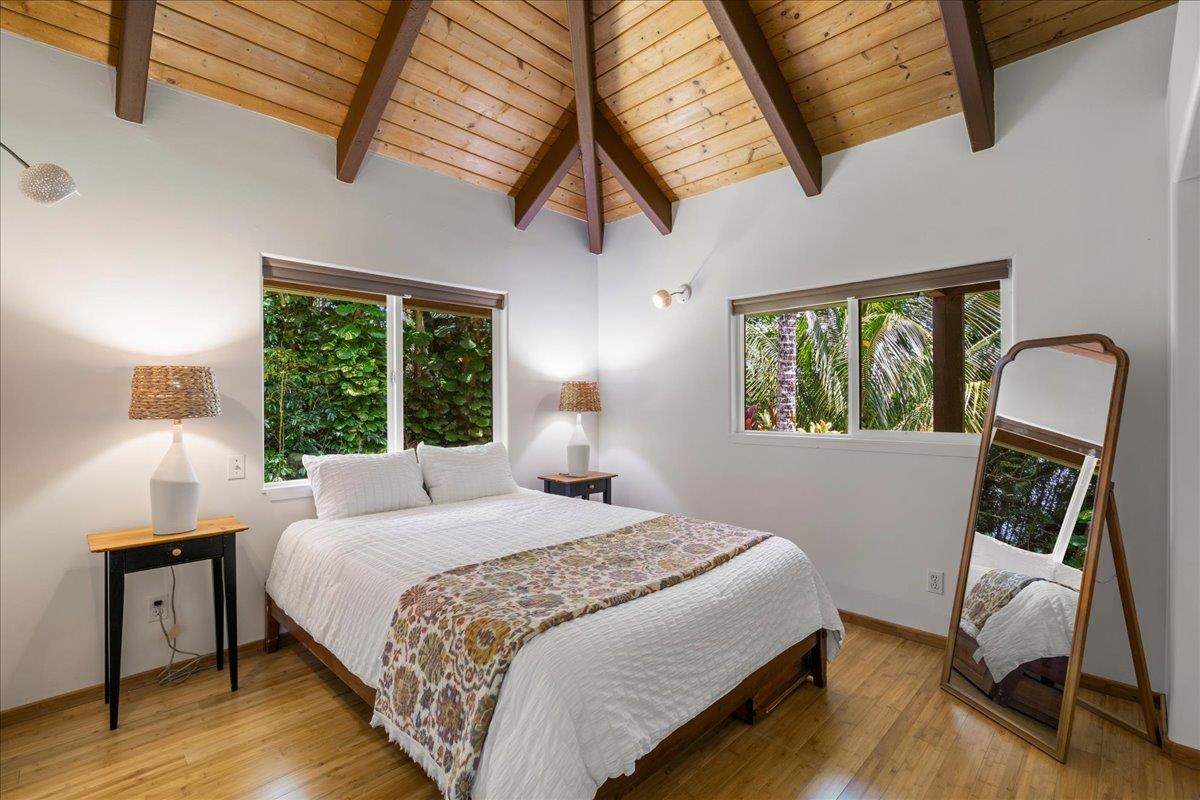 4510 Waha Place, Unit 2 Haiku, HI 96708 - Photo 14 of 36 a bedroom with a bed window and a window