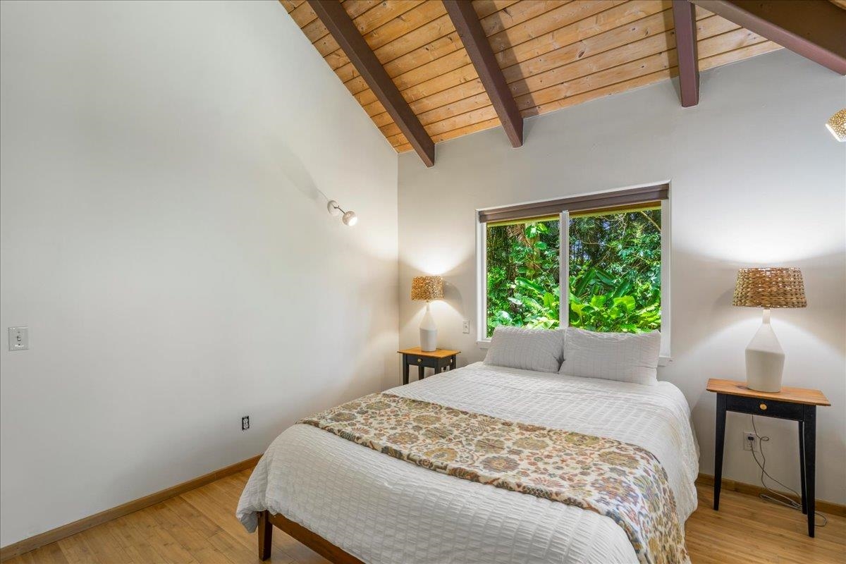 4510 Waha Place, Unit 2 Haiku, HI 96708 - Photo 15 of 36 a bedroom with a bed and a window