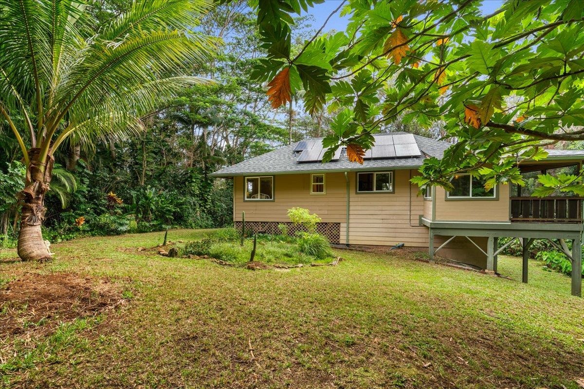 4510 Waha Place, Unit 2 Haiku, HI 96708 - Photo 31 of 36 a front view of house with yard and seating area
