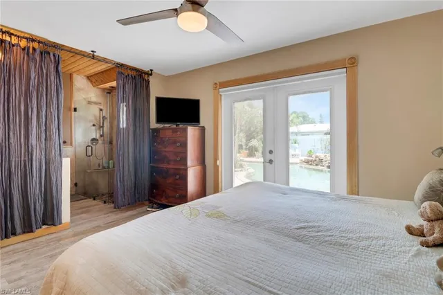 a bedroom with a bed and a closet