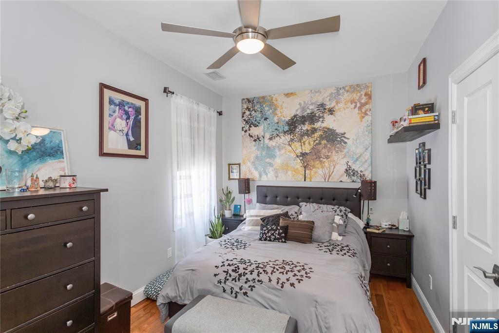 204 Hayward Place Wallington, NJ 07057 - Photo 21 of 39 a bedroom with a bed and a window