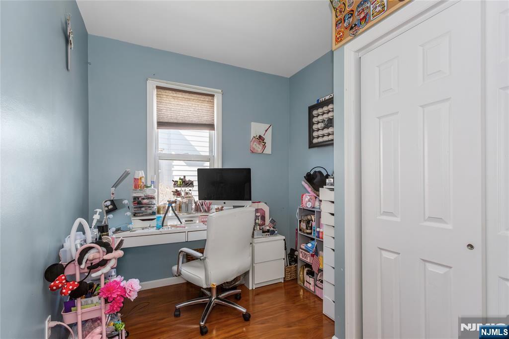 204 Hayward Place Wallington, NJ 07057 - Photo 10 of 39 a view of a workspace with furniture and a window