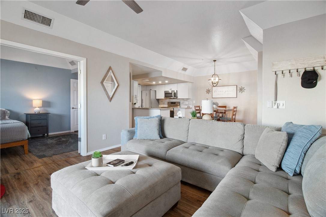 3550 Bay Sands Drive, Unit 2101 Laughlin, NV 89029 - Photo 3 of 49 Living room with dual door entry into the Second Bedroom. The Dining Area and Kitchen are also pictured.