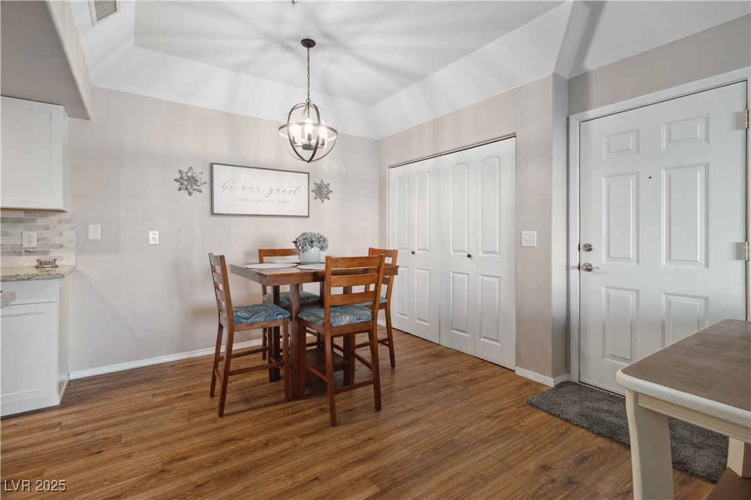 3550 Bay Sands Drive, Unit 2101 Laughlin, NV 89029 - Photo 4 of 49 The Dining area has a beautiful hanging light fixture.