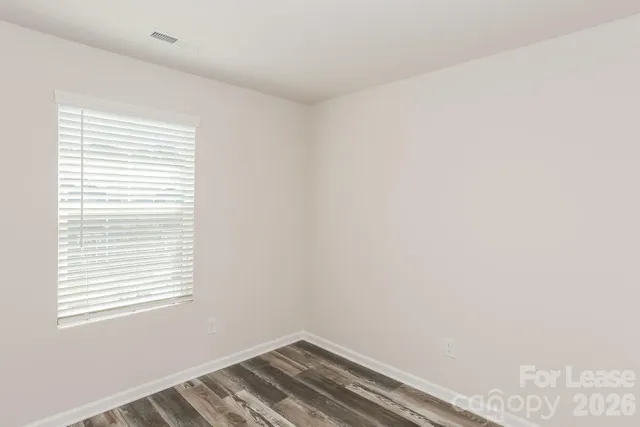 a view of a room with a window