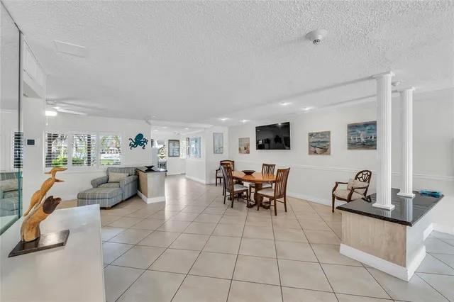 a bedroom with a bed and a chair