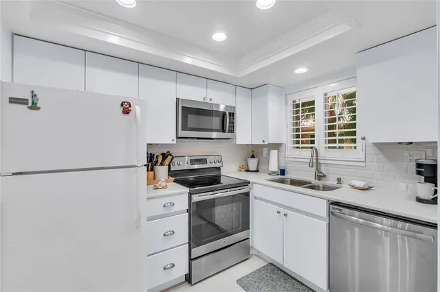 a bedroom with a bed and a view of bathroom