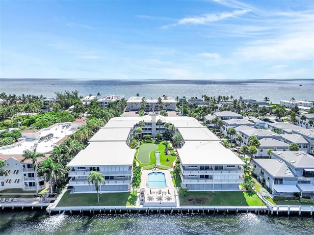 a view of a lake with a big yard