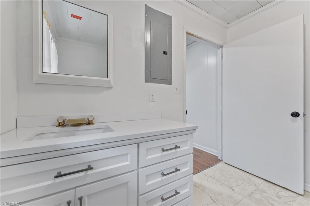 217 Lambert Road Biscoe, NC 27209 - Photo 26 of 28 3rd full bathroom near kitchen & carport