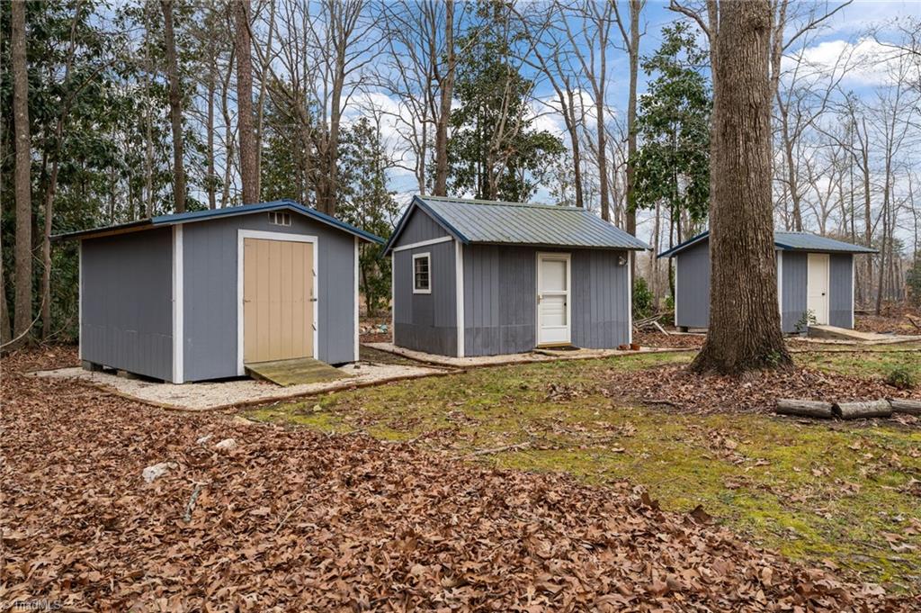 217 Lambert Road Biscoe, NC 27209 - Photo 28 of 28 Middle shed is wired with a/c & heat. Great office option.