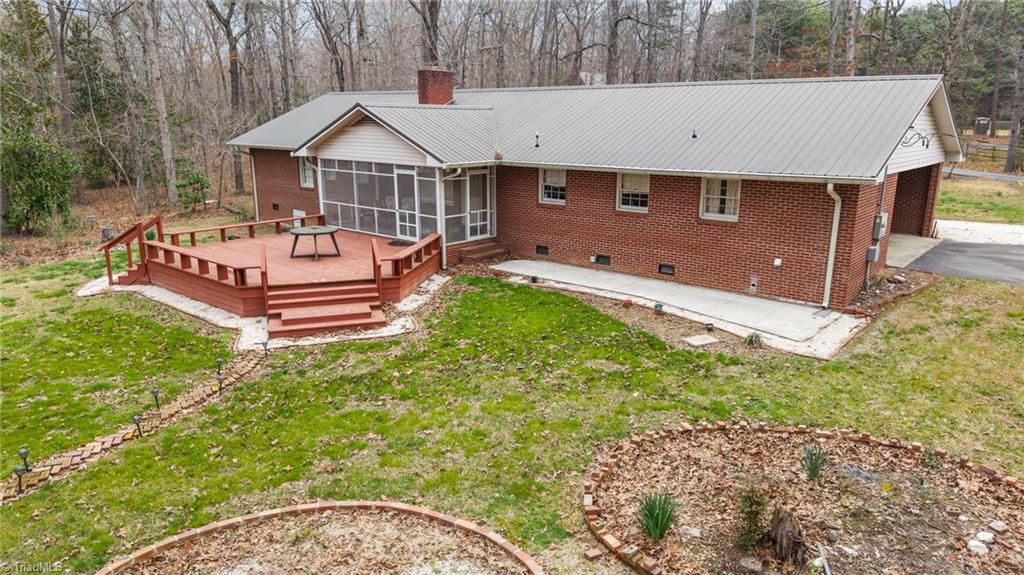 217 Lambert Road Biscoe, NC 27209 - Photo 4 of 28 Screened in back porch & deck