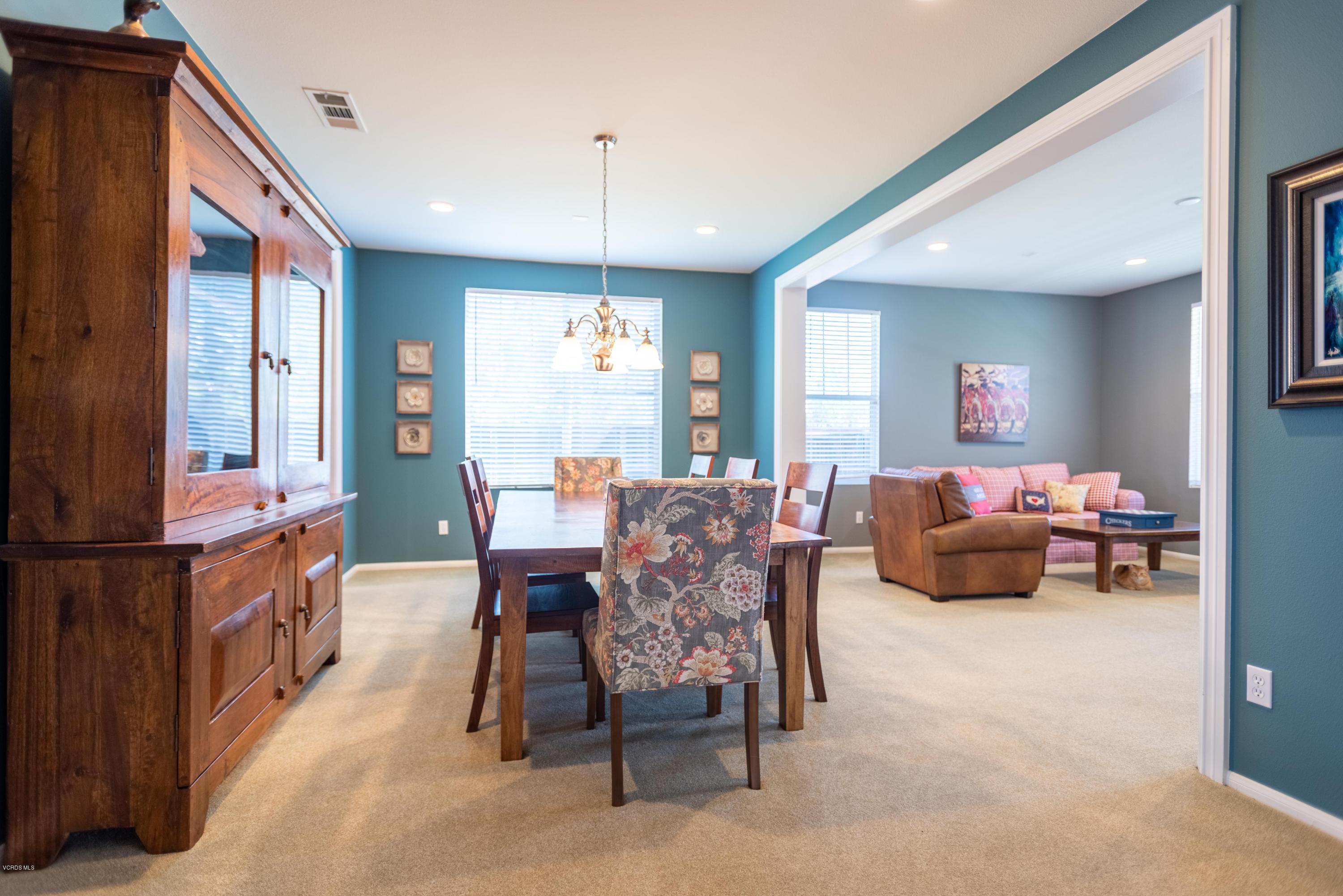 17118 Raindrop Court Riverside, CA 92503 - Photo 13 of 68 a view of a dining room with furniture