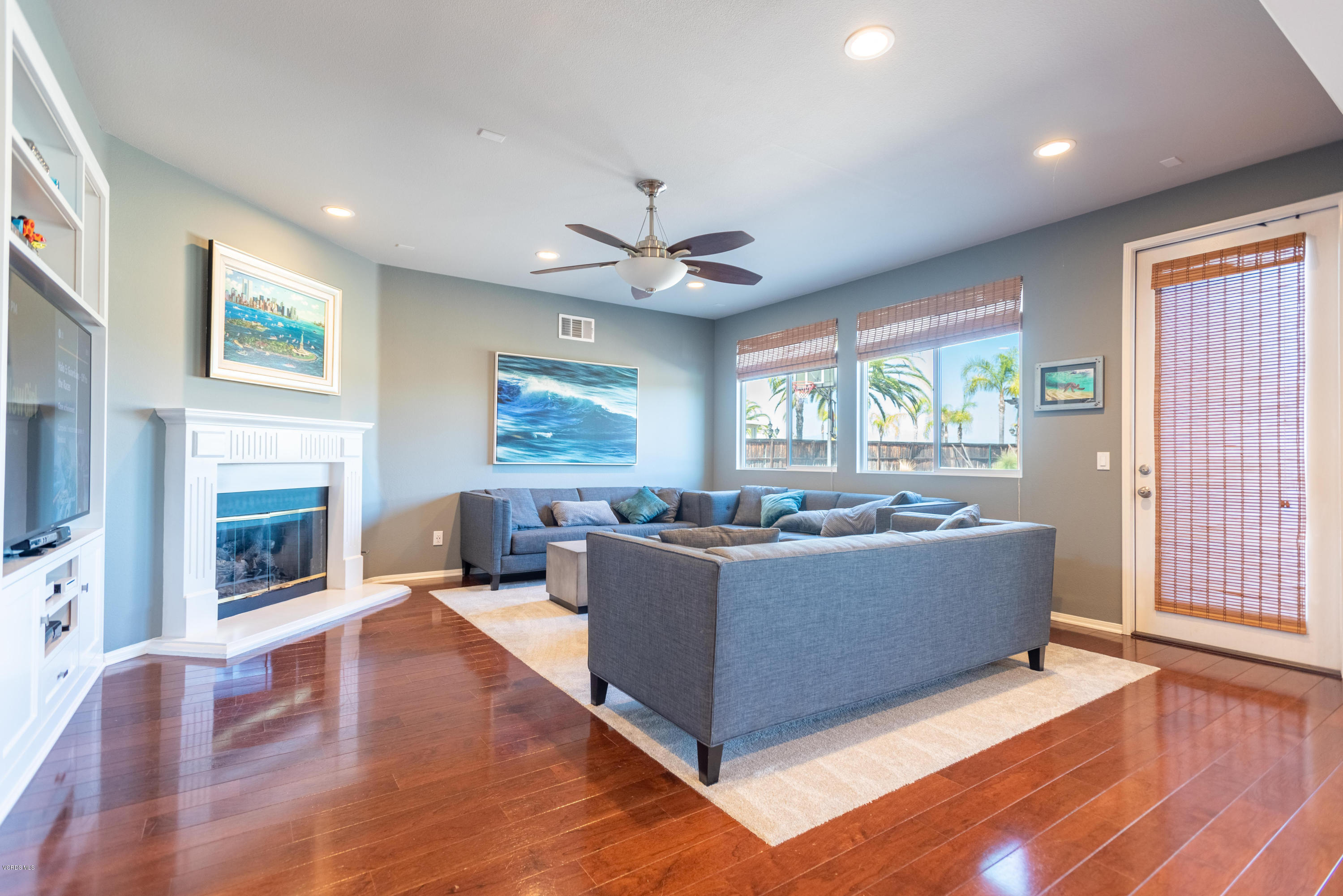 17118 Raindrop Court Riverside, CA 92503 - Photo 15 of 68 a living room with furniture and a fireplace