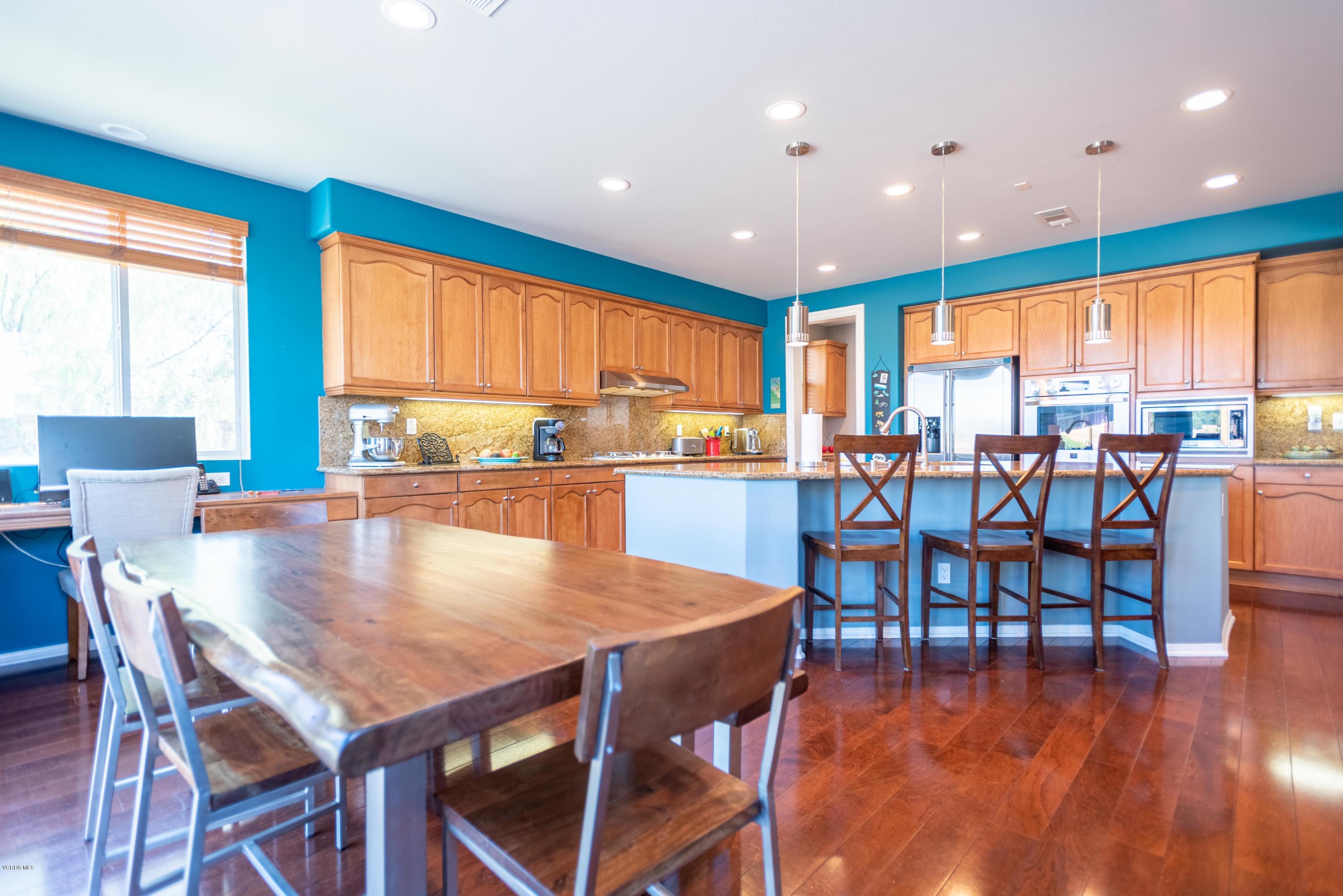 17118 Raindrop Court Riverside, CA 92503 - Photo 21 of 68 a dining room with furniture window and wooden floor