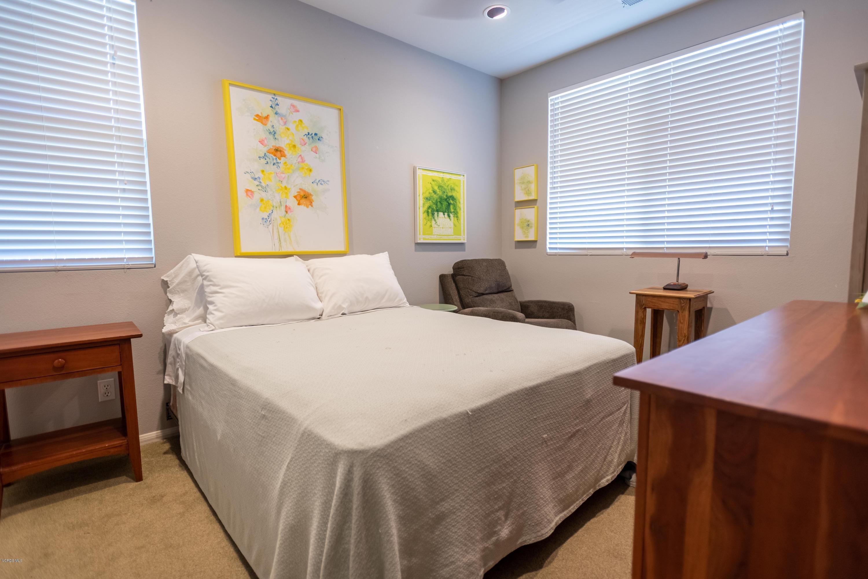 17118 Raindrop Court Riverside, CA 92503 - Photo 31 of 68 a bedroom with a bed and a window
