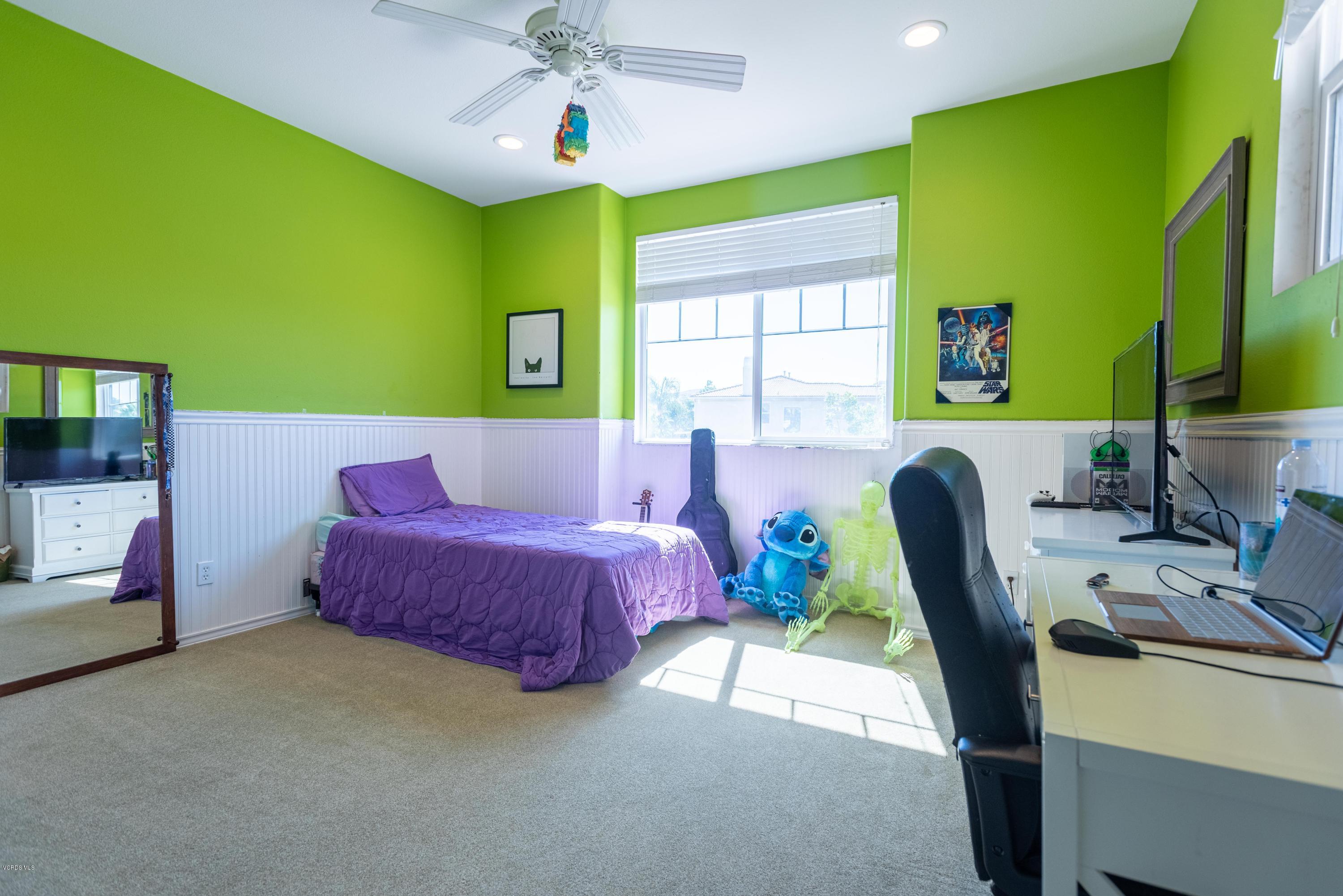 17118 Raindrop Court Riverside, CA 92503 - Photo 54 of 68 a bed room with a bed window and a chair
