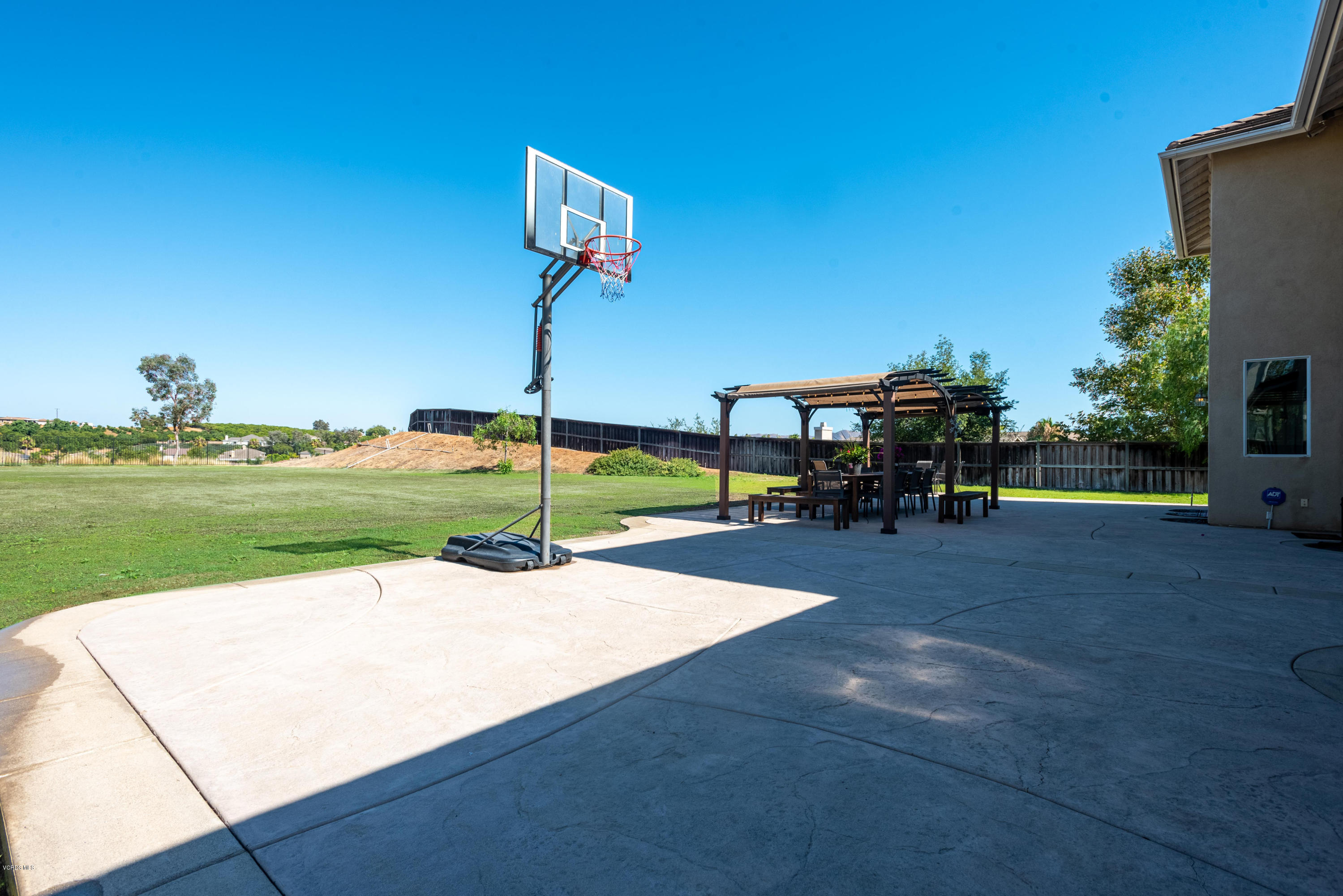 17118 Raindrop Court Riverside, CA 92503 - Photo 59 of 68 a view of a patio with a table and chairs