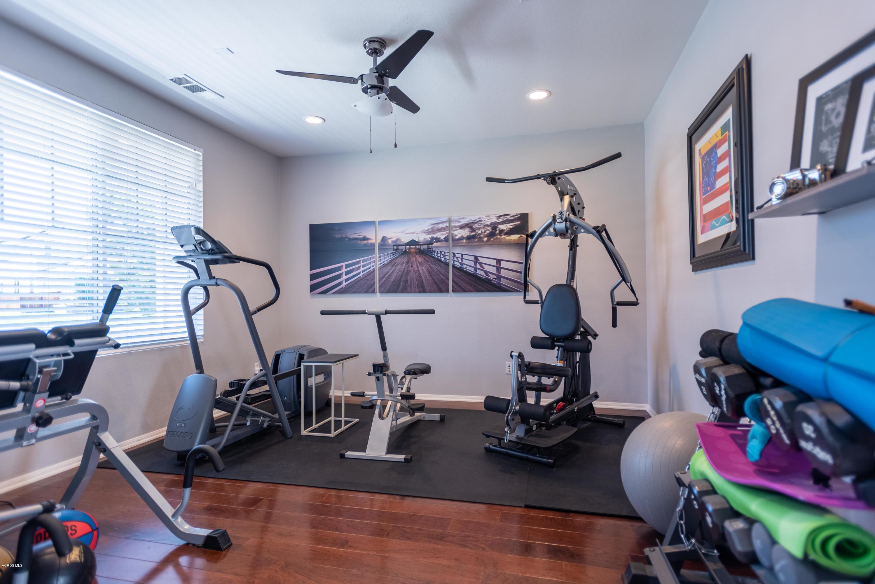 17118 Raindrop Court Riverside, CA 92503 - Photo 7 of 68 a view of a room with gym equipment