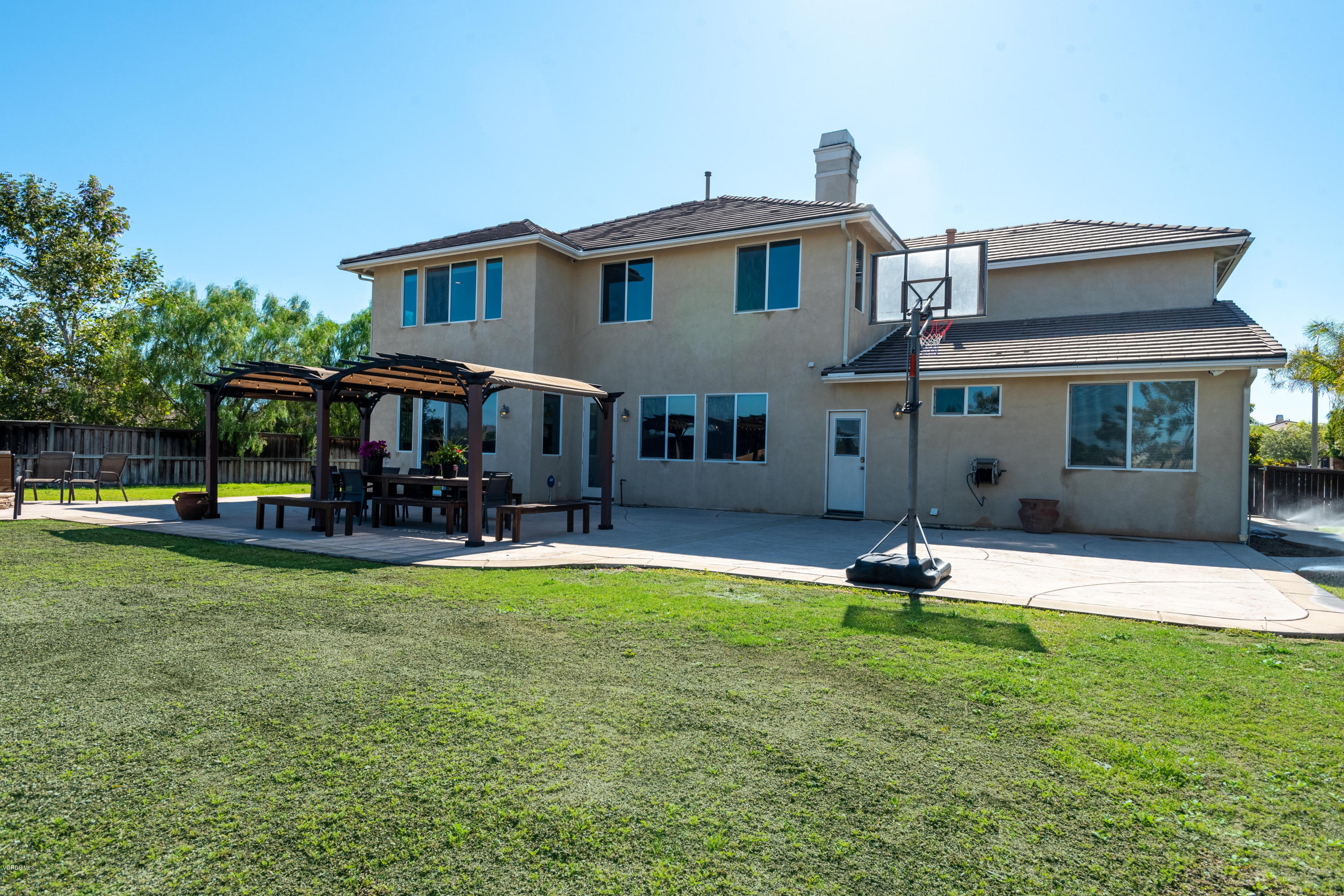17118 Raindrop Court Riverside, CA 92503 - Photo 61 of 68 a view of a house with swimming pool and a yard