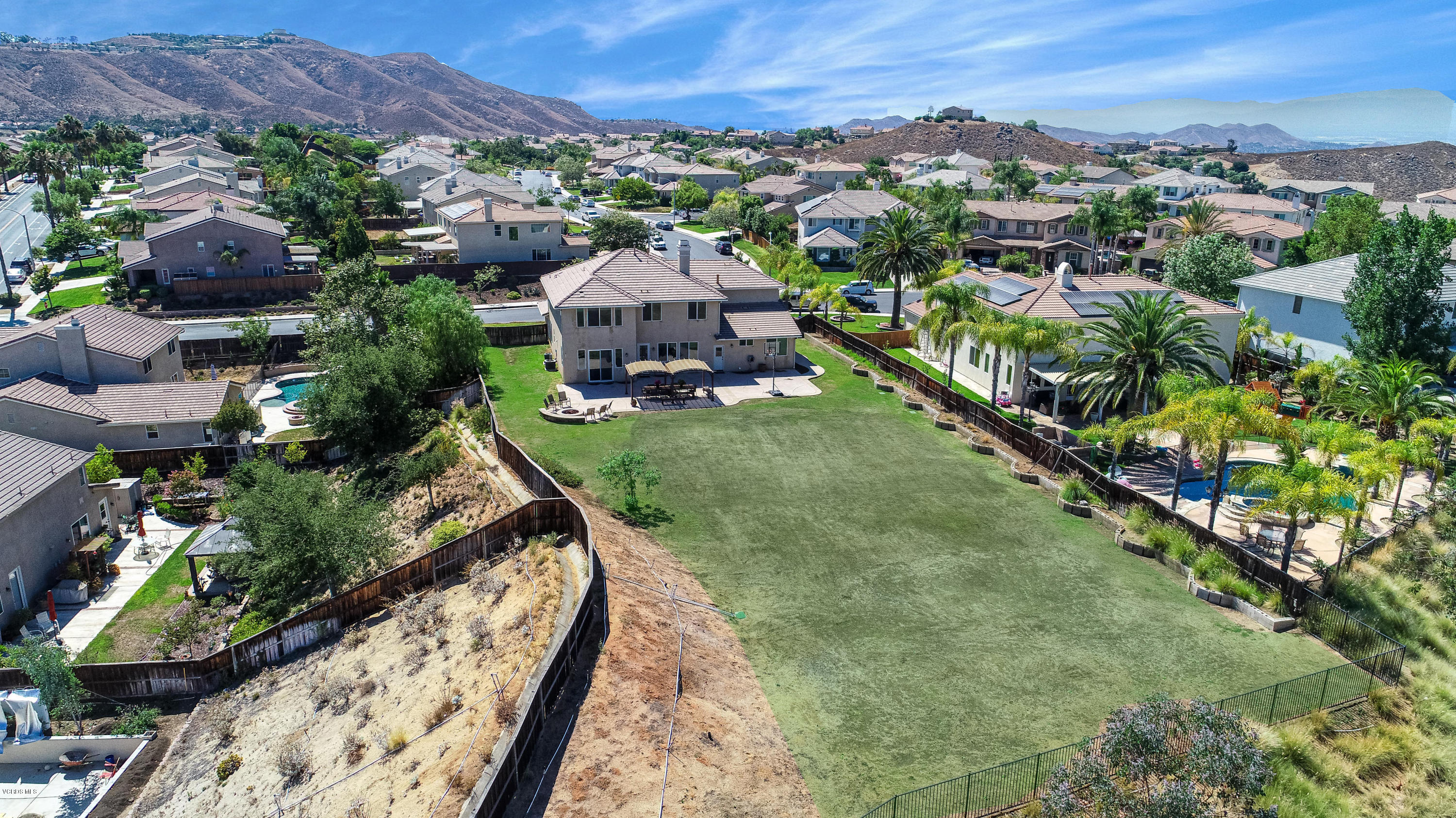 17118 Raindrop Court Riverside, CA 92503 - Photo 62 of 68 an aerial view of residential houses with outdoor space and trees