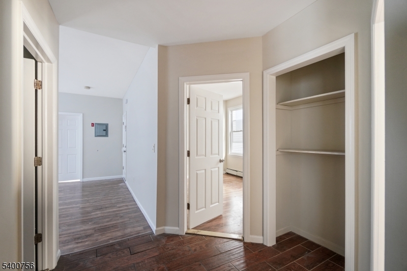 874 South 16th Street Newark, NJ 07108 - Photo 11 of 29 a view of a hallway with wooden floor