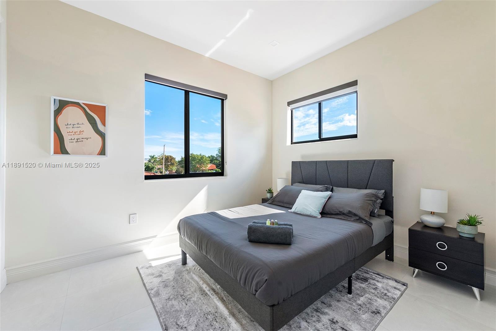 6529 Southwest 30th Street Miami, FL 33155 - Photo 17 of 45 a bedroom with a bed and a lamp on dresser