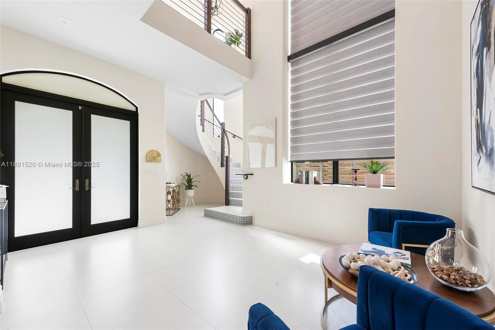 6529 Southwest 30th Street Miami, FL 33155 - Photo 21 of 45 a view of a workspace with furniture and a window