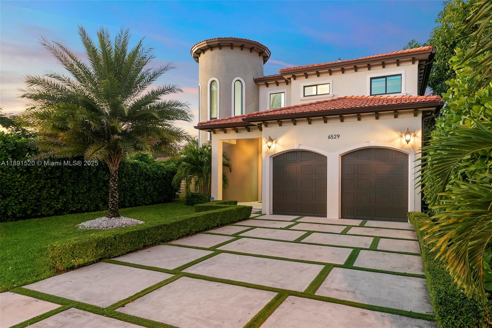 6529 Southwest 30th Street Miami, FL 33155 - Photo 5 of 45 a front view of a house with yard