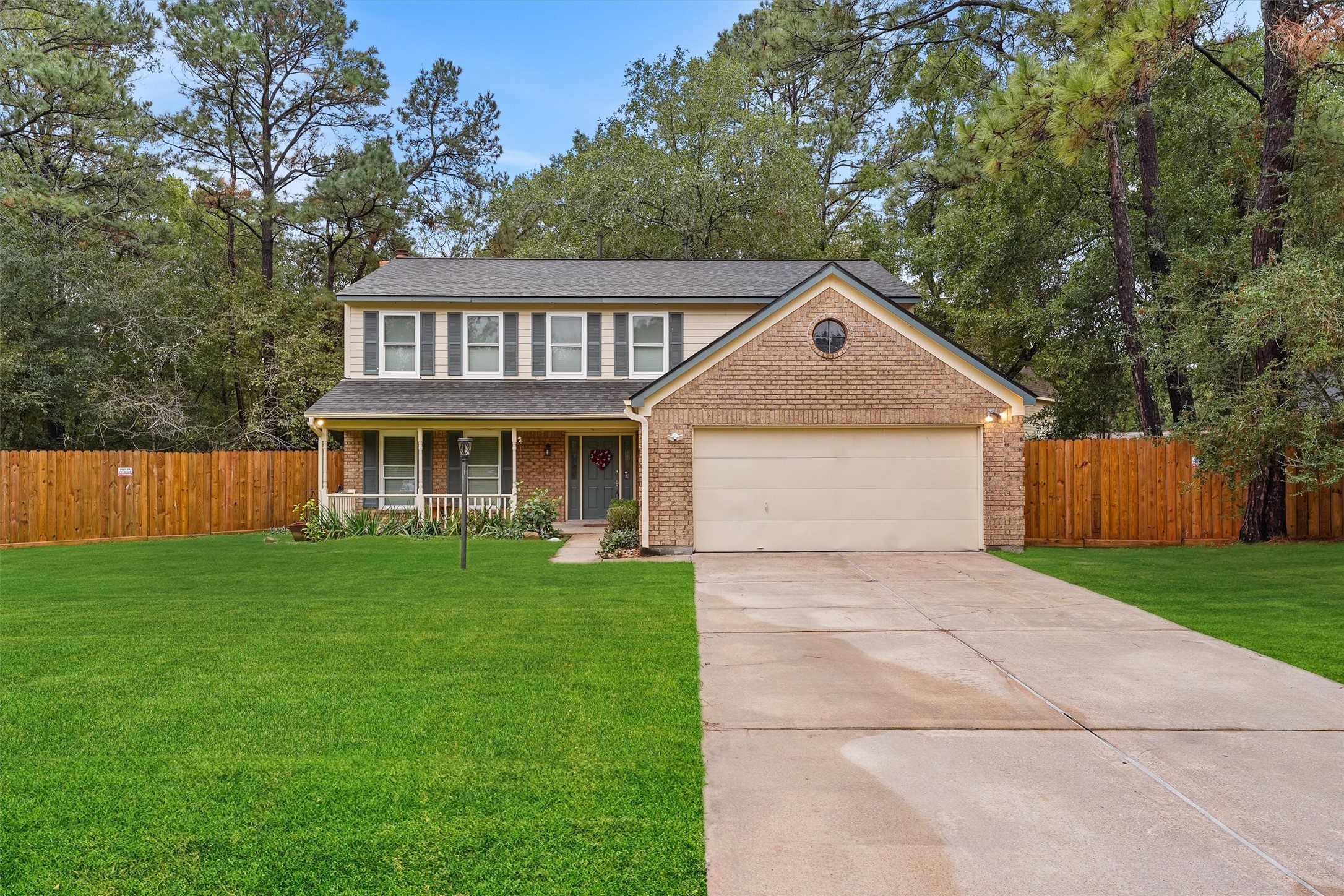 Great curb appeal with a long driveway.