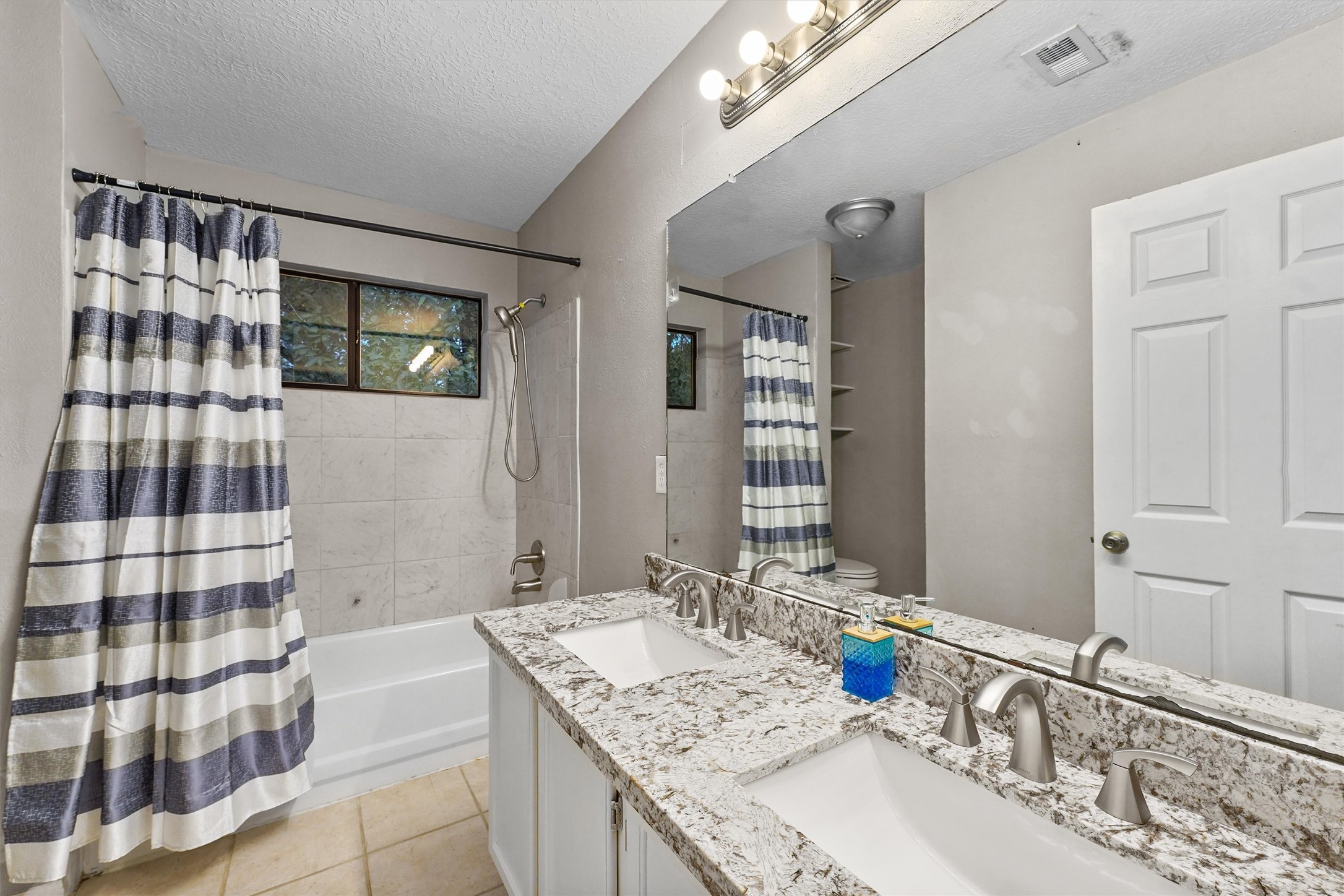 3702 Ember Spring Drive Kingwood, TX 77339 - Photo 21 of 29 Upstairs guest bath.