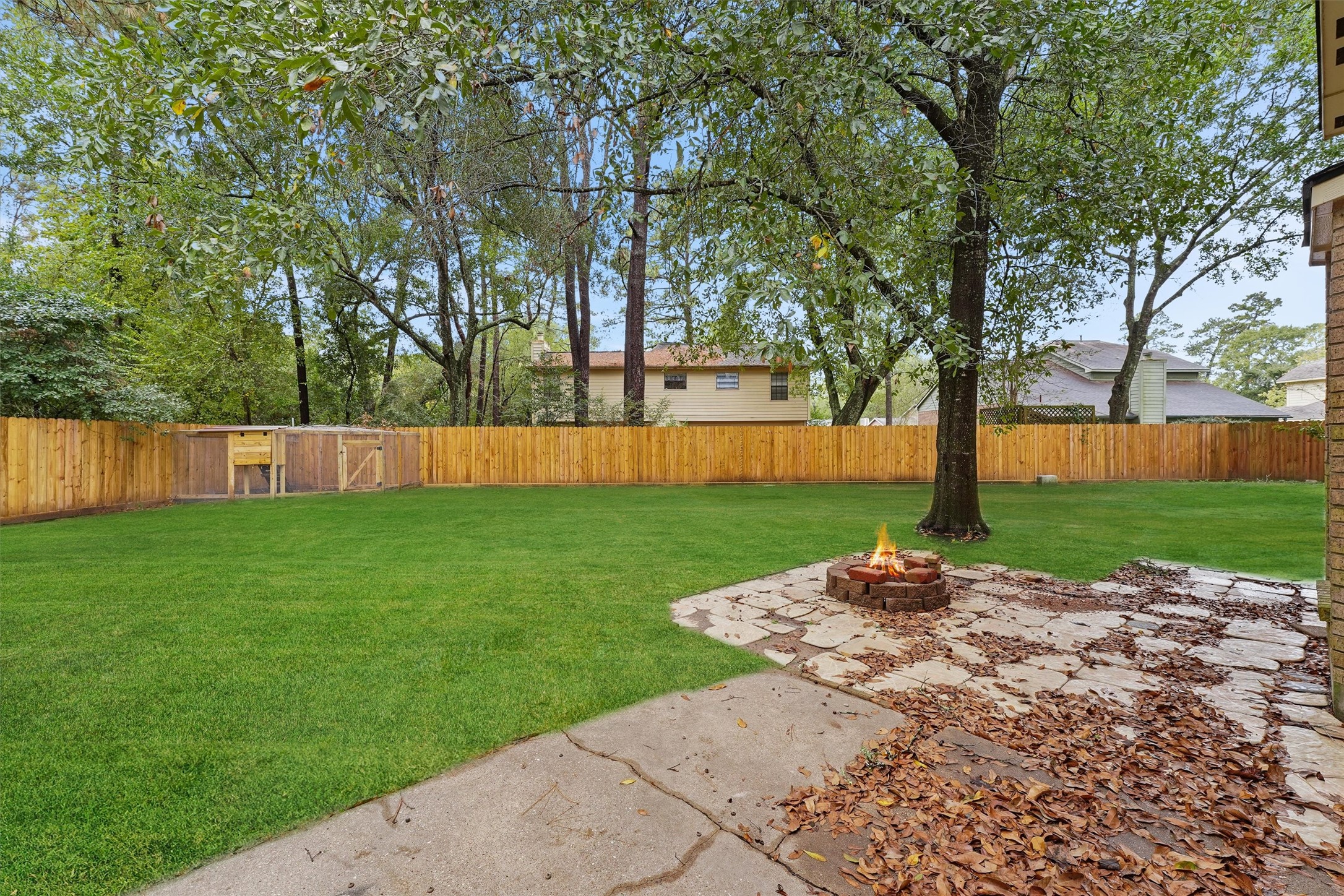 3702 Ember Spring Drive Kingwood, TX 77339 - Photo 4 of 29 Backyard (fire pit has been edited)
