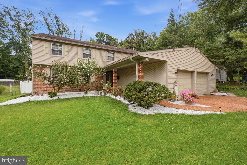 557 Covered Bridge Road Cherry Hill, NJ 08034 - Photo 2 of 43 Charming home with lush greenery.