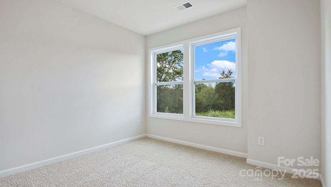 366 Lagoon Road Fletcher, NC 28732 - Photo 21 of 30 an empty room with a window